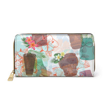 Load image into Gallery viewer, Tiki me baby! Enjoy this unique play on old time tiki prints. Let your retro style &quot;unfold&quot; with this Hawaiian Tiki inspired pocketbook.  Made with cruelty-free faux leather, this wallet comes packed with utility and beauty. Size: 7.87&quot; x 4.33&quot; (20cm x 11cm)
