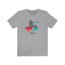 Load image into Gallery viewer, Short sleeve cotton T-Shirt for both men and women and offered in 5 great colors.  This comfy t-shirt combines all the iconic San Fran elements.  The golden gate bridge, seals, poppies, and the Cali spirit all in one beautiful design.  Perfect for a SF lover, California fan. 
