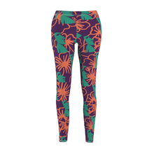 Load image into Gallery viewer, Tiki Flower Leggings with a dark purple background.  Orange outlined hibiscus flowers and teal green  Easter Island statue heads in a repeating pattern.
