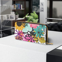 Load image into Gallery viewer, HIPPIE FLOWER ZIPPER WALLET - Flower wallet. Cute gift - Stylish wallet for women. Carry around all your credit cards, cash, and driver&#39;s licenses in style. Made with cruelty-free faux leather - Size: 7.87&quot; x 4.33&quot; (20cm x 11cm)
