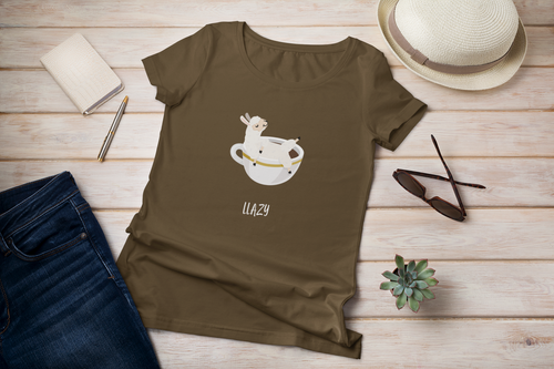 Llazy - Unisex Llama T-shirt .  Llama Unisex Tee.  Llama pun, funny tee.  Illustrated llama lounging in a big cup of coffee and the words, Llazy under it. Unique T-Shirts for men and women. This classic unisex jersey short sleeve tee fits like a well-loved favorite.  Perfect t-shirt fit for men or women.