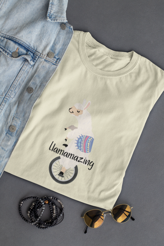 Llamazing -  Llama Unisex T-Shirt.  Llama pun, funny tee.  Illustrated llama riding a unicycle and the words, Llamazing across it. Unique T-Shirts for men and women. This classic unisex jersey short sleeve tee fits like a well-loved favorite.  Perfect t-shirt fit for men or women.