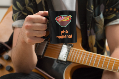 Damn straight you're Pho-nomenal!! Funny Pho soup inspired coffee mug. This mug should bring out your inner badass. Inspired by all of those not afraid to shine on! Warm your soul with a nice cuppa out of this perfectly sized black ceramic mug. It’s microwave and dishwasher safe and made of black, durable ceramic in an 11-ounce size. This mug the perfect gift for your true coffee, tea, or hot chocolate lover.